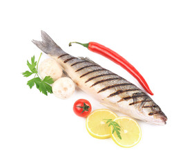 Grilled seabass with pepper and mushrooms.