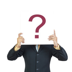 Business man holding question sign or present showing over head