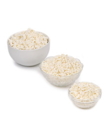 Three bowls with cottage cheese.