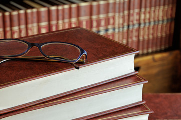 stack of books and glasses detail