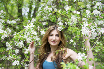 Beautiful young woman with flowers.