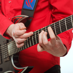 Rock guitarist plays solo guitar