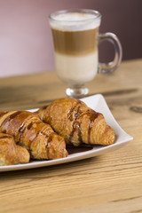 Iced mocha coffee with croissants