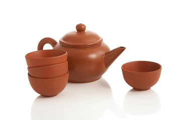 chinese teapot and cup on white background