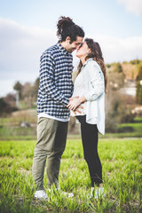 Fototapeta premium Pregnant Woman with her Housband Outside