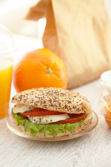 An organic sandwich with tomato and mozarella