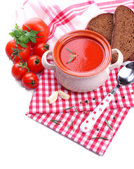 Tasty tomato soup and vegetables, isolated on white