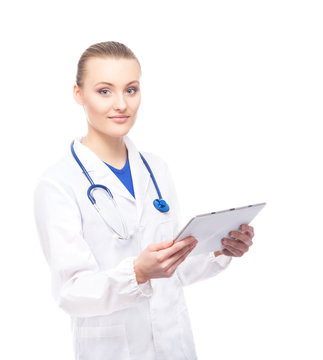 A Cheerful Doctor Woman With A Tablet Computer Isolated On White