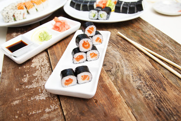 A set of sushi on a wooden table