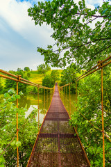 Fototapety  metalowy most wiszący nad rzeką