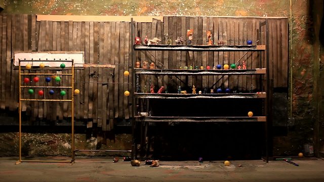 shooting cans and toys in shooting range