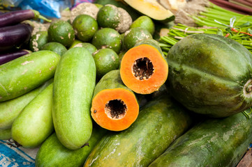 Papaya and fresh organic vegetables and fruits at asian market