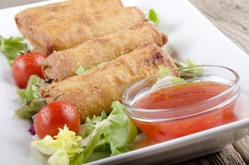 chinese spring rolls on a plate