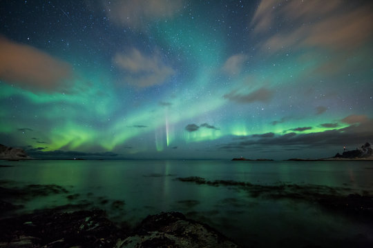 Northern lights above a beach in Norway