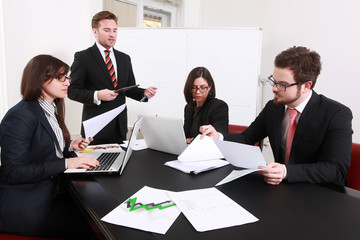 Business people having board meeting