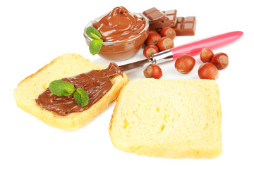 Bread with sweet chocolate hazelnut spread isolated on white