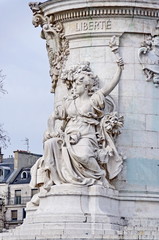 Fototapeta na wymiar Statue de femme. Socle de la statue de la République, Paris.