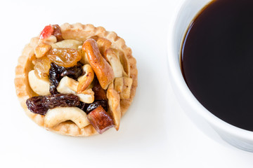 Black coffee and Fruit Tart  on wooden table