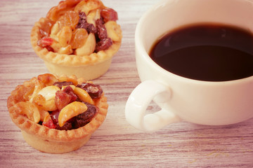 vintage black coffee and Fruit Tart  on wooden table