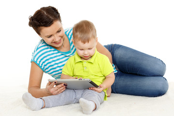 Happy family with computer tablet.