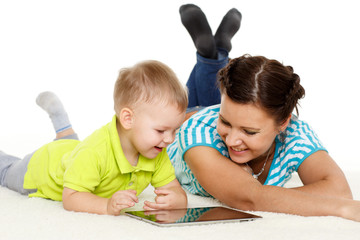 Happy family with computer tablet.
