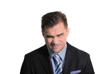 angry and dissatisfied businessman on a white background