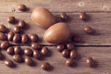 Chocolate Easter Eggs Over Wooden Background