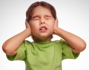 baby girl closed her eyes loud noise fear isolated