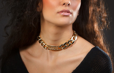 Beautiful woman with yellow necklace