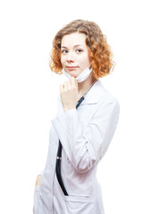 cute redhead doctor in lab coat with mask