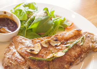beef steak on wooden table