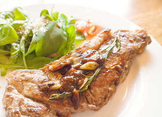 beef steak on wooden table