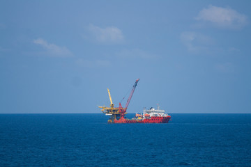 Oil and gas platform in the gulf or the sea,