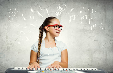 School girl with piano