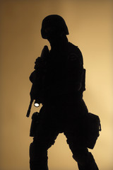 SWAT officer silouette in the fog
