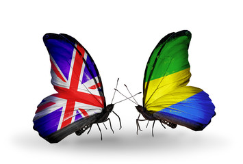 Two butterflies with flags UK and Gabon