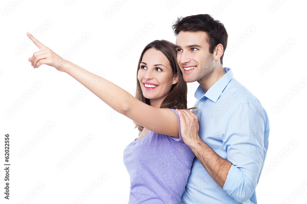 Poster young couple pointing