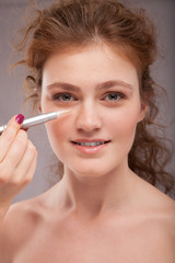 Fototapeta premium Makeup. Cosmetic. Base for Perfect Make-up.Applying Make-up