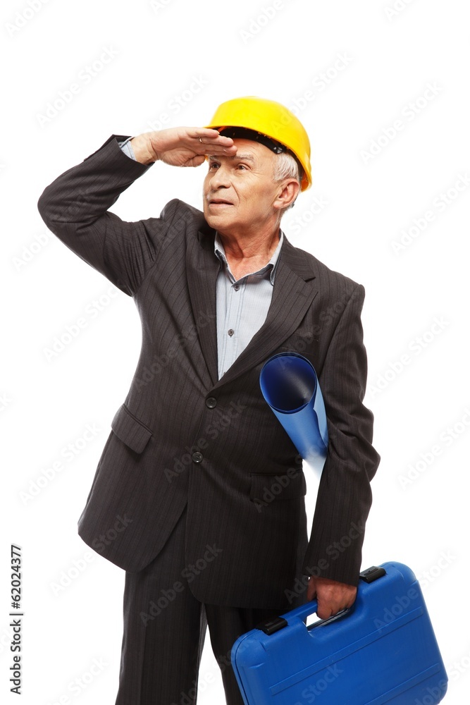 Wall mural senior man engineer with construction site plan