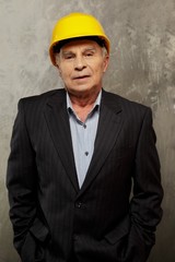 Senior man engineer wearing protective helmet