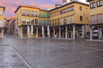Ancient main square with arcades after rain in Tordesillas, Spai