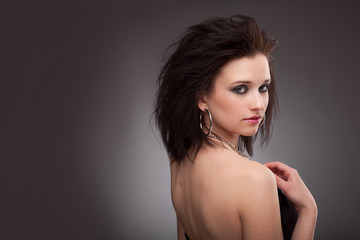 Fototapeta premium Beautiful young woman with black hair