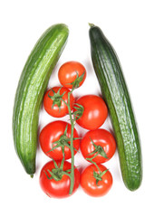 Obraz na płótnie Canvas Cucumber and red tomatos