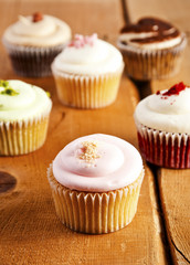 cupcakes on wooden background