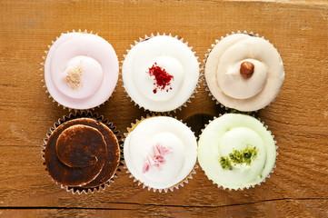 cupcakes on wooden background