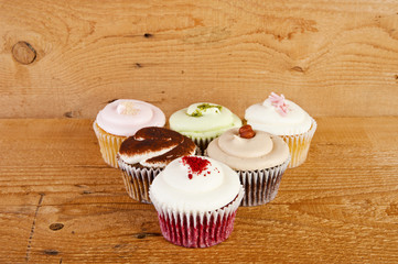 cupcakes on wooden background
