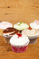 cupcakes on wooden background