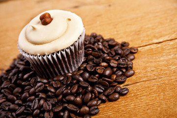 chocolate cupcake on old wooden table