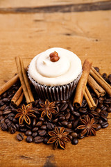 chocolate cupcake on old wooden table
