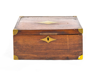 Closed wooden box over isolated white background